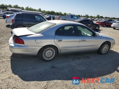 Trzecie zdjęcie samochodu z tyłu: 2002 MERCURY SABLE GS VIN:1MEFM50U82A627703 - miniatura