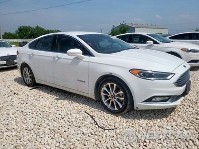 Czwarte zdjęcie samochodu z boku: 2017 FORD FUSION SE HYBRID VIN:3FA6P0LU8HR409045 - miniatura