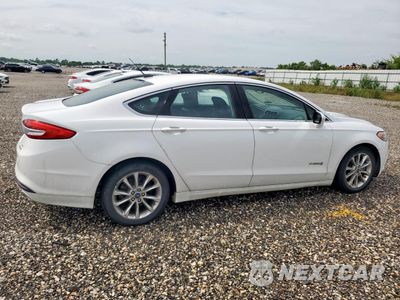 Trzecie zdjęcie samochodu z tyłu: 2017 FORD FUSION SE HYBRID VIN:3FA6P0LU6HR410145 - miniatura