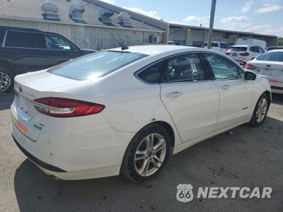 Trzecie zdjęcie samochodu z tyłu: 2018 FORD FUSION SE HYBRID VIN:3FA6P0LU6JR172027 - miniatura