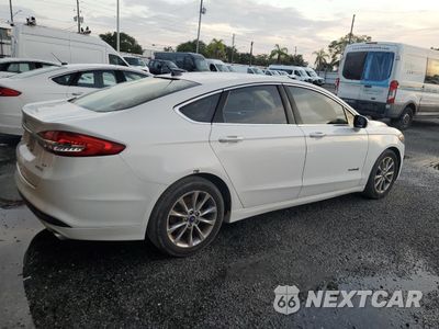 Trzecie zdjęcie samochodu z tyłu: 2017 FORD FUSION SE HYBRID VIN:3FA6P0LU5HR409648 - miniatura