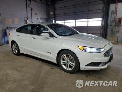 Czwarte zdjęcie samochodu z boku: 2018 FORD FUSION SE HYBRID VIN:3FA6P0LU7JR129851 - miniatura