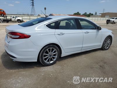 Trzecie zdjęcie samochodu z tyłu: 2017 FORD FUSION SE HYBRID VIN:3FA6P0LU1HR408903 - miniatura