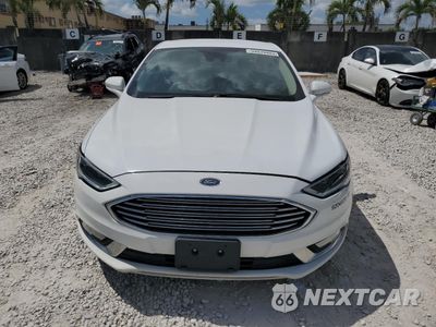 Piąte zdjęcie samochodu w środku: 2017 FORD FUSION SE HYBRID VIN:3FA6P0LU5HR409469 - miniatura