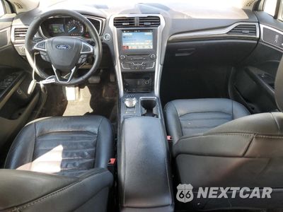 Zdjęcie 8 z 12 samochodu: 2018 FORD FUSION SE HYBRID VIN:3FA6P0LU1JR171917 - miniatura