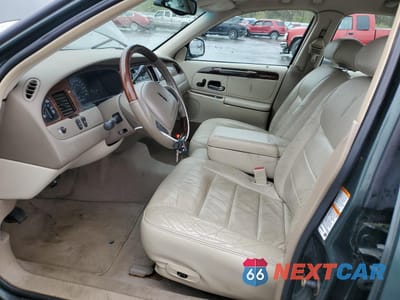 Zdjęcie 7 z 12 samochodu: 2001 LINCOLN TOWN CAR SIGNATURE VIN:1LNHM82W91Y708947 - miniatura