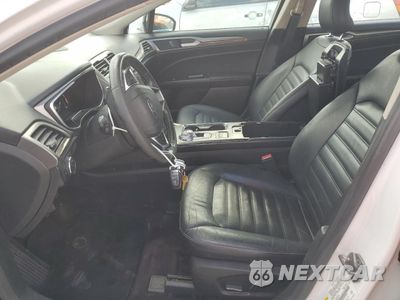 Zdjęcie 7 z 12 samochodu: 2017 FORD FUSION SE HYBRID VIN:3FA6P0LU6HR359536 - miniatura