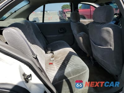 Zdjęcie 10 z 12 samochodu: 2001 CHEVROLET LUMINA VIN:2G1WL52J011271871 - miniatura