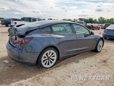 Trzecie zdjęcie samochodu z tyłu: 2022 TESLA MODEL 3 VIN:5YJ3E1EB8NF200308 - miniatura