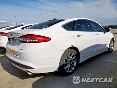 Trzecie zdjęcie samochodu z tyłu: 2017 FORD FUSION SE HYBRID VIN:3FA6P0LU8HR409014 - miniatura