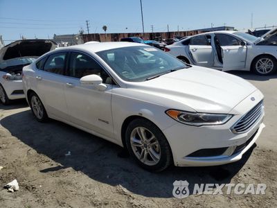 Czwarte zdjęcie samochodu z boku: 2018 FORD FUSION SE HYBRID VIN:3FA6P0LU2JR172137 - miniatura