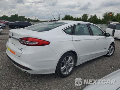 Trzecie zdjęcie samochodu z tyłu: 2018 FORD FUSION SE HYBRID VIN:3FA6P0LU2JR171876 - miniatura