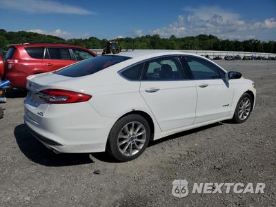 Trzecie zdjęcie samochodu z tyłu: 2017 FORD FUSION SE HYBRID VIN:3FA6P0LU8HR359537 - miniatura
