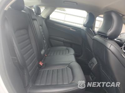Zdjęcie 11 z 15 samochodu: 2017 FORD FUSION SE HYBRID VIN:3FA6P0LUXHR409239 - miniatura