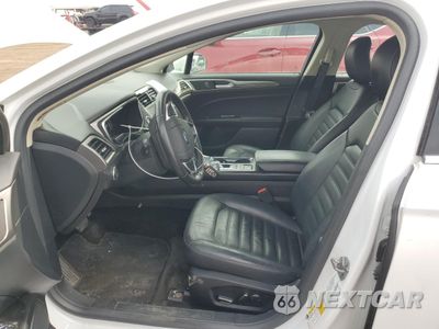 Zdjęcie 7 z 13 samochodu: 2017 FORD FUSION SE HYBRID VIN:3FA6P0LU4HR409060 - miniatura