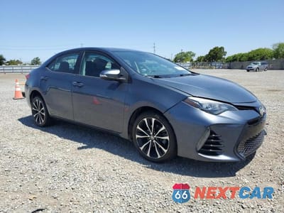 Czwarte zdjęcie samochodu z boku: 2017 TOYOTA COROLLA SE VIN:5YFBURHE7HP685651 - miniatura