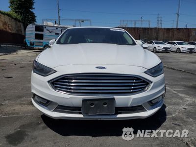 Piąte zdjęcie samochodu w środku: 2017 FORD FUSION SE HYBRID VIN:3FA6P0LU3HR409325 - miniatura