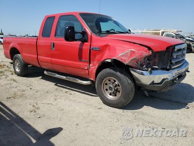 Czwarte zdjęcie samochodu z boku: 2002 FORD F250 SUPER DUTY VIN:1FTNX21F72ED56435 - miniatura
