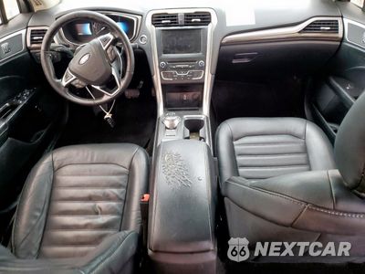 Zdjęcie 8 z 12 samochodu: 2018 FORD FUSION SE HYBRID VIN:3FA6P0LU1JR118649 - miniatura