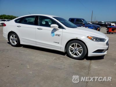 Czwarte zdjęcie samochodu z boku: 2018 FORD FUSION SE HYBRID VIN:3FA6P0LU6JR171654 - miniatura