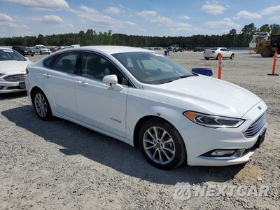 Czwarte zdjęcie samochodu z boku: 2017 FORD FUSION SE HYBRID VIN:3FA6P0LU1HR409520 - miniatura