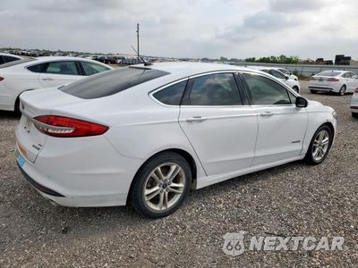 Trzecie zdjęcie samochodu z tyłu: 2018 FORD FUSION SE HYBRID VIN:3FA6P0LU2JR163549 - miniatura