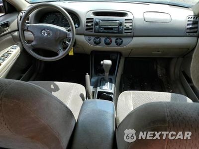 Zdjęcie 8 z 12 samochodu: 2003 TOYOTA CAMRY LE VIN:4T1BE32K93U133388 - miniatura