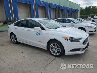 Czwarte zdjęcie samochodu z boku: 2018 FORD FUSION SE HYBRID VIN:3FA6P0LU9JR118852 - miniatura