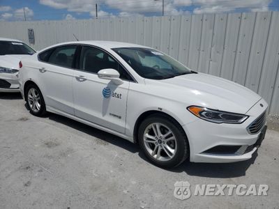 Czwarte zdjęcie samochodu z boku: 2018 FORD FUSION SE HYBRID VIN:3FA6P0LU0JR278716 - miniatura