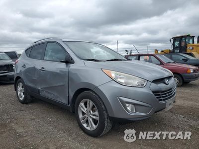 Czwarte zdjęcie samochodu z boku: 2013 HYUNDAI TUCSON GLS VIN:KM8JU3AC0DU684089 - miniatura