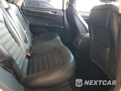 Zdjęcie 10 z 13 samochodu: 2017 FORD FUSION SE HYBRID VIN:3FA6P0LUXHR409693 - miniatura