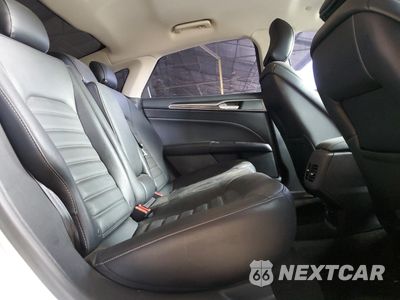 Zdjęcie 10 z 12 samochodu: 2017 FORD FUSION SE HYBRID VIN:3FA6P0LU4HR409706 - miniatura