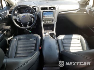 Zdjęcie 8 z 13 samochodu: 2017 FORD FUSION SE HYBRID VIN:3FA6P0LU7HR408906 - miniatura