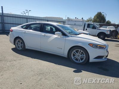Czwarte zdjęcie samochodu z boku: 2018 FORD FUSION SE HYBRID VIN:3FA6P0LU3JR118880 - miniatura