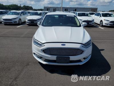 Piąte zdjęcie samochodu w środku: 2017 FORD FUSION SE HYBRID VIN:3FA6P0LU9HR409247 - miniatura
