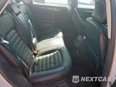 Zdjęcie 10 z 12 samochodu: 2017 FORD FUSION SE HYBRID VIN:3FA6P0LU7HR409411 - miniatura