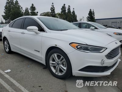 Czwarte zdjęcie samochodu z boku: 2018 FORD FUSION SE HYBRID VIN:3FA6P0LU4JR278623 - miniatura