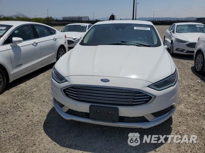 Piąte zdjęcie samochodu w środku: 2018 FORD FUSION SE HYBRID VIN:3FA6P0LU2JR171571 - miniatura