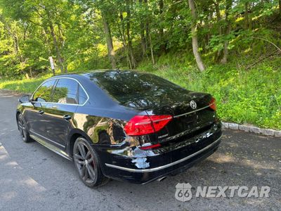 Czwarte zdjęcie samochodu z boku: 2016 VOLKSWAGEN PASSAT S VIN:1VWAT7A33GC047557 - miniatura