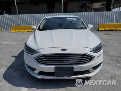 Piąte zdjęcie samochodu w środku: 2018 FORD FUSION SE HYBRID VIN:3FA6P0LU1JR163512 - miniatura