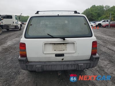Zdjęcie 6 z 13 samochodu: 1994 JEEP GRAND CHEROKEE LAREDO VIN:1J4GZ58S8RC122201 - miniatura