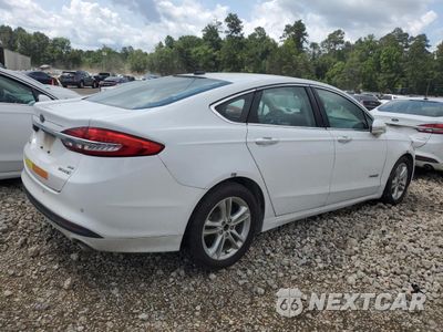 Trzecie zdjęcie samochodu z tyłu: 2018 FORD FUSION SE HYBRID VIN:3FA6P0LU0JR171696 - miniatura