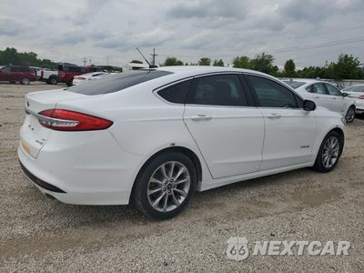 Trzecie zdjęcie samochodu z tyłu: 2017 FORD FUSION SE HYBRID VIN:3FA6P0LU9HR409510 - miniatura