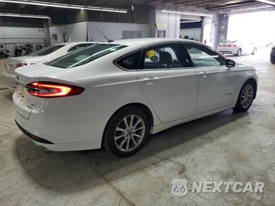 Trzecie zdjęcie samochodu z tyłu: 2017 FORD FUSION SE HYBRID VIN:3FA6P0LU2HR409414 - miniatura