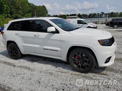 Czwarte zdjęcie samochodu z boku: 2017 JEEP GRAND CHEROKEE SRT-8 VIN:1C4RJFDJ6HC633669 - miniatura