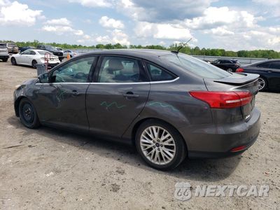 Drugie zdjęcie samochodu z przodu: 2016 FORD FOCUS TITANIUM VIN:1FADP3J29GL384695 - miniatura
