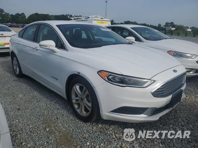 Czwarte zdjęcie samochodu z boku: 2018 FORD FUSION SE HYBRID VIN:3FA6P0LU7JR171906 - miniatura