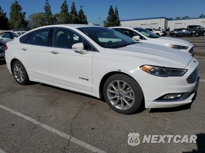 Czwarte zdjęcie samochodu z boku: 2017 FORD FUSION SE HYBRID VIN:3FA6P0LU9HR409152 - miniatura