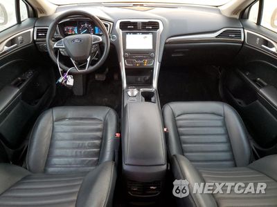 Zdjęcie 8 z 12 samochodu: 2018 FORD FUSION SE HYBRID VIN:3FA6P0LU7JR163501 - miniatura