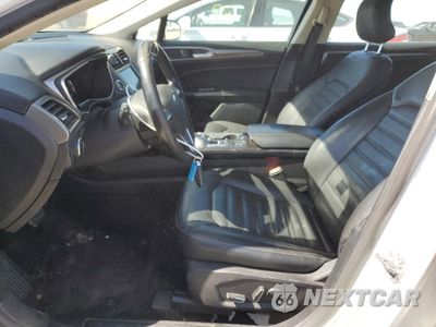 Zdjęcie 7 z 12 samochodu: 2017 FORD FUSION SE HYBRID VIN:3FA6P0LU2HR409378 - miniatura